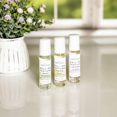 A trio of Simply Stated Bath & Body’s Kids Roll-On Perfume in Magic Rainbow, Tropical Twist, and Unicorn Kisses, designed with gentle, kid-friendly scents in a mess-free roll-on applicator.